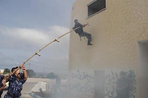 صور.. استعراض عسكري وطابور أركان لشرطة التدخل بخانيونس