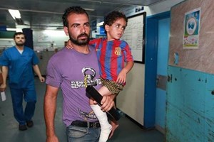 Israeli Aviation Shelling Destroys Gaza National Bank and Facilities,14 Palestinians killed,3 Police officers