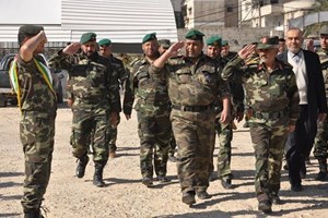 الأمن الوطني يُنظم طابور أركان عسكري لقواته بغزة